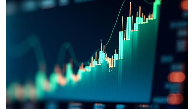 Stock market graph trending upwards on a digital display